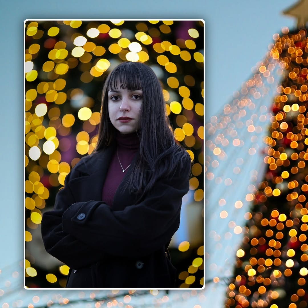 Gentle presence, wrapped in warm lights.